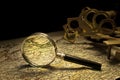 Nautical sextant and magnifying glass Royalty Free Stock Photo