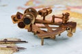 nautical sextant with optics, compass and ruler lying on paper world map Royalty Free Stock Photo