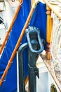 Nautical tackles and equipment of the old tall ship. Rigging ropes and rope ladder on the mast of sailing vessel Royalty Free Stock Photo