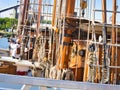 Nautical tackles and equipment of the old tall ship. Rigging ropes and rope ladder on the mast of sailing vessel