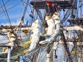 Nautical tackles and equipment of the old tall ship. Rigging ropes and rope ladder on the mast of sailing vessel