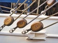 Nautical tackles and equipment of the old tall ship. Rigging ropes and rope ladder on the mast of sailing vessel