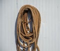 Nautical Themed Background - Orange rope on blank antique rustic wooden background Royalty Free Stock Photo