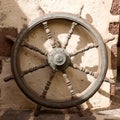 Nautical wooden boat ship steering wheel Royalty Free Stock Photo