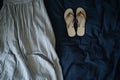 nauticalstriped dress with flipflops on navy bedding