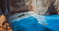 Navagio beach panoramic shot in moody vintage waved bay water and abandoned shipwreck on shore. Zakynthos Island, Greece Royalty Free Stock Photo