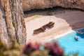 Navagio beach with shipwreck and flowers on Zakynthos island, Greece