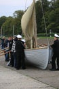 Cadets of the Kronstadt naval cadet corps and civil visitors near the rowing-sailing boat
