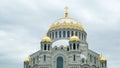 Naval cathedral in Kronstadt, Saint Petersburg, Russia. Concept. Amazing church with gold domes on cloudy sky background