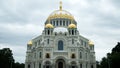 Naval cathedral of Saint Nicholas in Kronstadt, St.-Petersburg, Russia. Concept. Breathtaking white church with gold