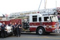 A Naval District Fire Truck and its firefighters