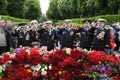 Naval officers, veterans of World War II, saluting near Eternal Flame in the Glory park. Celebration of Victory Day