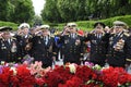 Naval officers, veterans of World War II, saluting near Eternal Flame in the Glory park. Celebration of Victory Day