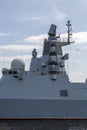 Naval sailors observe over the coast through binoculars from the frigate Admiral of the Fleet Kasatonov at the pier in St. Petersb Royalty Free Stock Photo