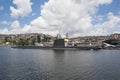 Naval submarine moored in large river