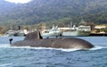Naval submarine submerge near navy base Royalty Free Stock Photo