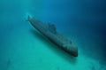 Naval submarine submerge underwater during a mission Royalty Free Stock Photo