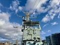 the naval ship has a turret at the center of it Royalty Free Stock Photo