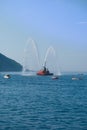 Two jets of sea water sprayed by a fire engine of a firefighters Royalty Free Stock Photo