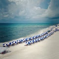 Navarre, Florida Beach Lined With Beach Umbrellas. Square format. Copy space. Royalty Free Stock Photo