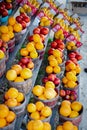 Navel orange, honeybell oranges, tomatoes, mangos carton boxes on shelves display roadside market stand in Santa Rosa, Destin, Royalty Free Stock Photo