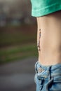 Navel piercing close up Royalty Free Stock Photo