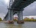 Navigating the Hudson River under the Manhattan Bridge Royalty Free Stock Photo