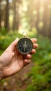 Navigating Through Nature Hand Holding Compass in Forest Setting Outdoors Royalty Free Stock Photo