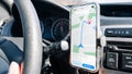 Navigation auto map system GPS. Global positioning system on smartphone screen in auto car on travel road. GPS Royalty Free Stock Photo