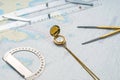 Navigation still-life composition with items on a map Royalty Free Stock Photo