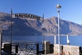 The Navigazione sign on the ferry boat boarding zone docking of Abbadia Lariana on Como Lake Royalty Free Stock Photo