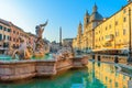 Navona Square or Piazza Navona in Rome, Italy with fountain. Rome architecture and landmark at sunrise