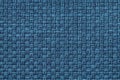 Navy blue background with checkered pattern, closeup. Structure of the fabric macro. Royalty Free Stock Photo