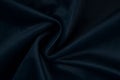 Navy blue fabric texture - close-up of a piece of crushed and twisted navy blue satin Royalty Free Stock Photo