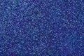 Navy blue sparkling background from small sequins, closeup. Brilliant backdrop Royalty Free Stock Photo