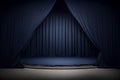 Navy blue stage with velvet curtains and spotlights. Royalty Free Stock Photo