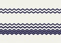 Navy blue zigzag patterns repeat horizontally against a white Royalty Free Stock Photo