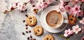 a navy cup of coffee paired with a few cookies, adorned with delicate sakura blossoms on the table, in a close-up shot.