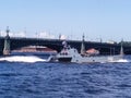 Navy Day. The parade of naval technology. Gray warship with sailors on board