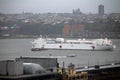 Navy hospital ship Comfort floating through the skyscrapers on the Hudson river