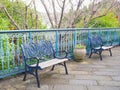 Navy metal bench in the glover garden