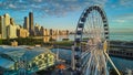 Navy Pier in Chicago by ferris wheel with Chicago skyline