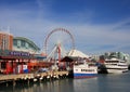 Navy Pier of Chicago with Ferris Wheel and Tour Boats with Blue Sky Background. November 30,2007 in Chicago, IL, USA Royalty Free Stock Photo