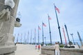 Navy Pier, Chicago. Row of flags fluttering in evening breeze as sky darkens. Illinois, USA Royalty Free Stock Photo