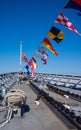 Navy ship bow with nautical flags