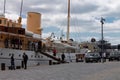 Navy ship with danish royal family member arriving at the docks of Helsingor, Denmark