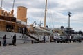 Navy ship with danish royal family member arriving at the docks of Helsingor, Denmark
