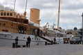 Navy ship with danish royal family members arriving at the docks of Helsingor, Denmark