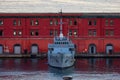 Navy Warship at a port of Historic Downtown City on Mediterranean Coast of Naples, Italy