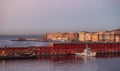 Navy Warship at a port with Historic Downtown City on Mediterranean Coast of Naples, Italy